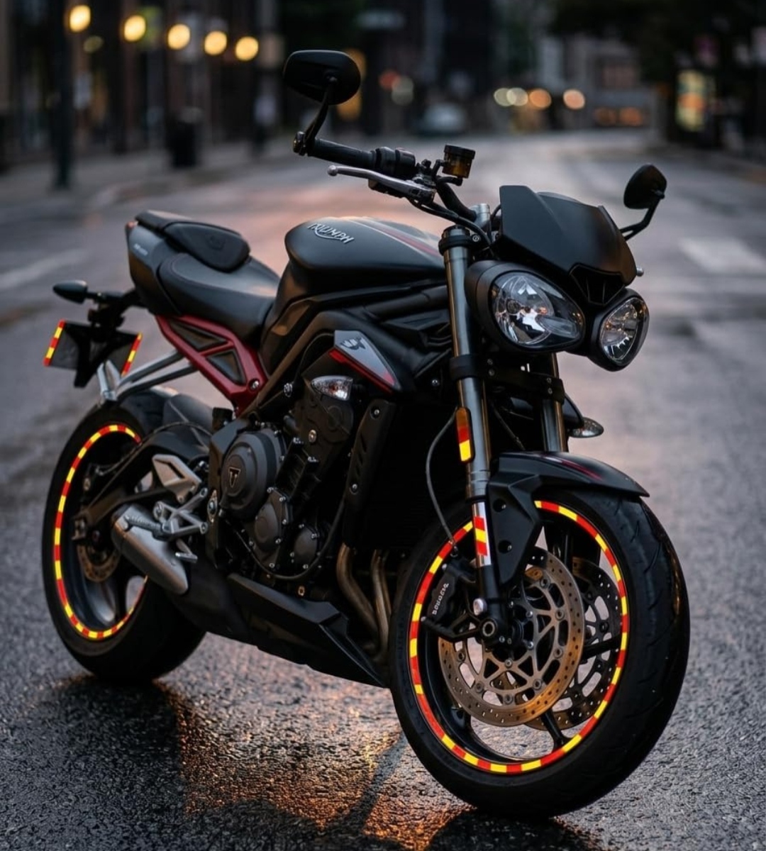 Motorcycle with reflective tape on wheels — Laps of Luxury